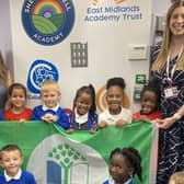 Eco Council pupils at Shepherdswell receive their Green Flag